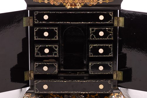 Lot 179 - A Victorian papier mache table writing cabinet,...