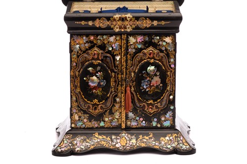 Lot 179 - A Victorian papier mache table writing cabinet,...