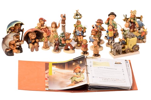 Lot 222 - A large collection of modern Hummel figures,...