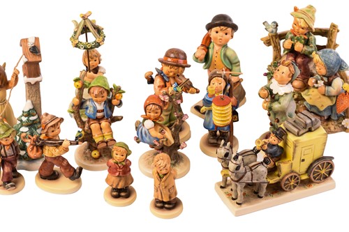Lot 222 - A large collection of modern Hummel figures,...