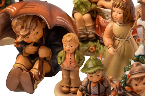 Lot 222 - A large collection of modern Hummel figures,...