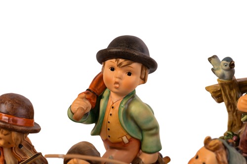 Lot 222 - A large collection of modern Hummel figures,...