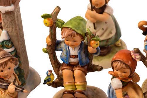 Lot 222 - A large collection of modern Hummel figures,...