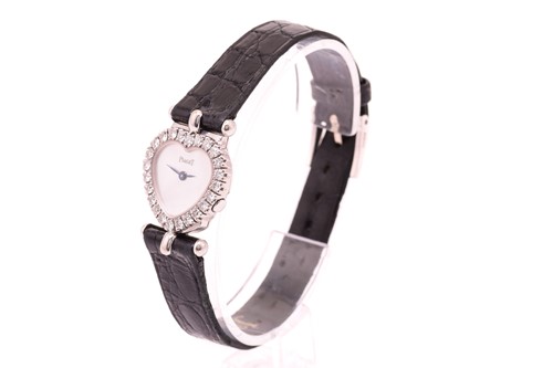 Lot 343 - A Piaget lady's diamond set dress watch, with...