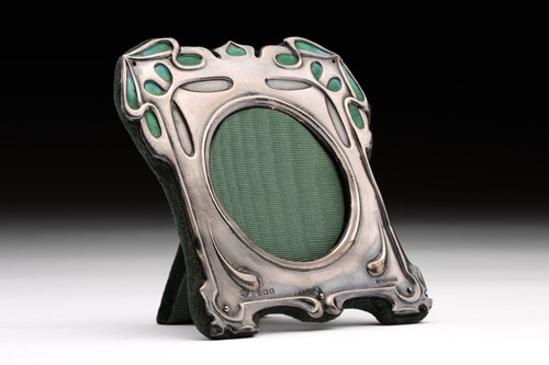 Lot 392 - An Edwardian silver and enamel photograph...