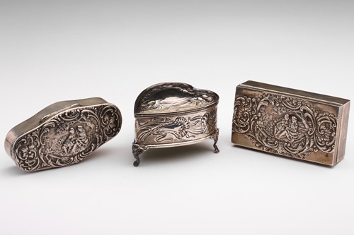 Lot 387 - Three Edwardian silver trinket boxes,...