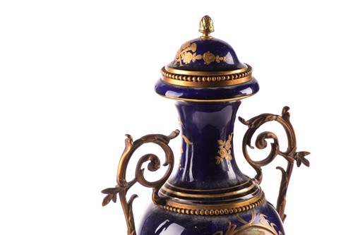 Lot 223 - A pair of large Sevres style vases and covers,...