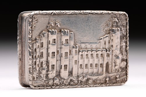 Lot 406 - A George IV castle top vinaigrette depicting...