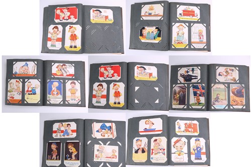 Lot 197 - A vintage postcard album containing many...