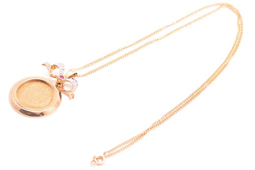 Lot 14 - A sovereign coin pendant on chain, consisting...