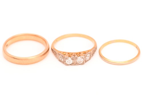 Lot 56 - An Art Deco diamond ring and two wedding bands;...