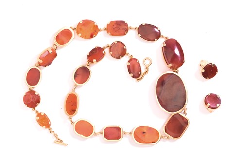 Lot 239 - A multi-shaped carnelian and sardonyx necklace...