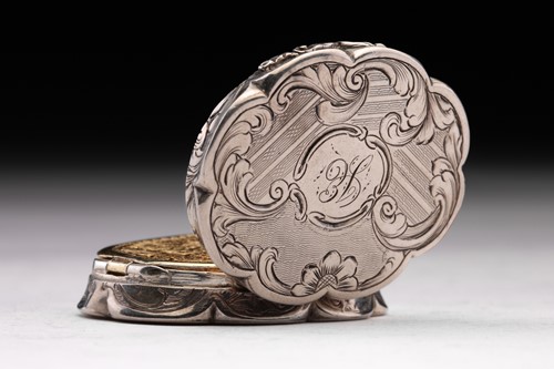 Lot 376 - A Victorian vinaigrette; shaped oval with...