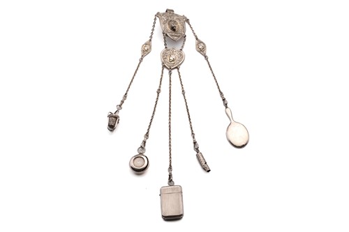 Lot 450 - A 19th century continental chatelaine, with...