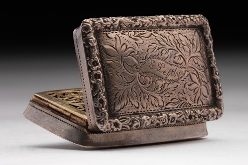 Lot 414 - A George IV snuff box; rounded rectangular...