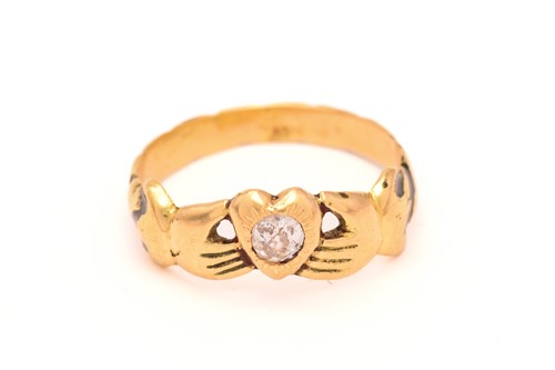 Lot 45 - A Fede ring set with a diamond, depicting two...