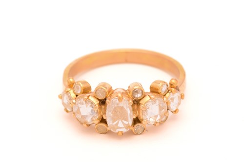 Lot 18 - A rose-cut diamond cluster half hoop ring,...