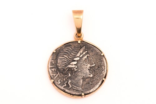 Lot 182 - A Roman silver coin pendant, showcasing a M....
