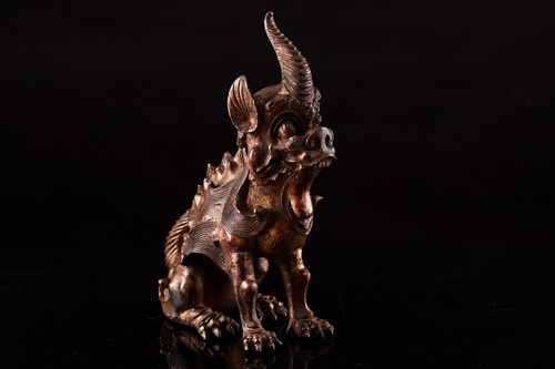 Lot 99 - A Chinese bronze censer in the form of an...