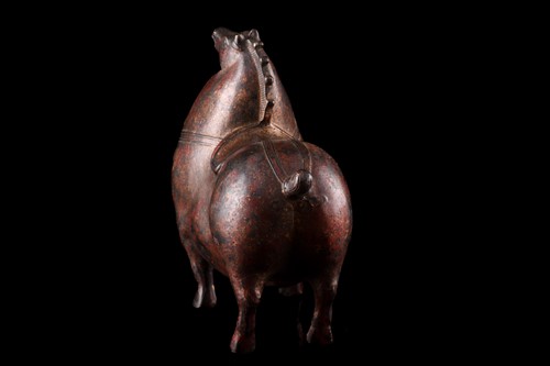 Lot 77 - A Chinese Tang Dynasty style bronze figure of...