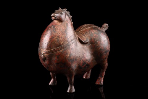Lot 77 - A Chinese Tang Dynasty style bronze figure of...