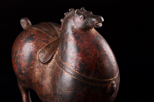 Lot 77 - A Chinese Tang Dynasty style bronze figure of...