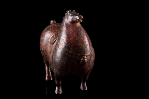 Lot 77 - A Chinese Tang Dynasty style bronze figure of...