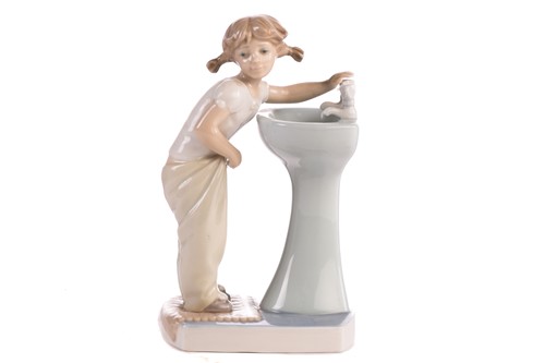 Lot 220 - Two Lladro figural table lamp bases, each...