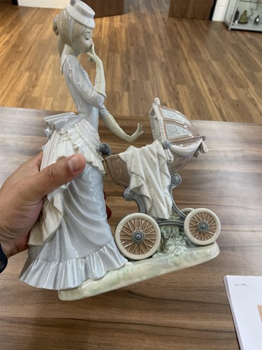 Lot 221 - A group of five large Lladro figures, to...