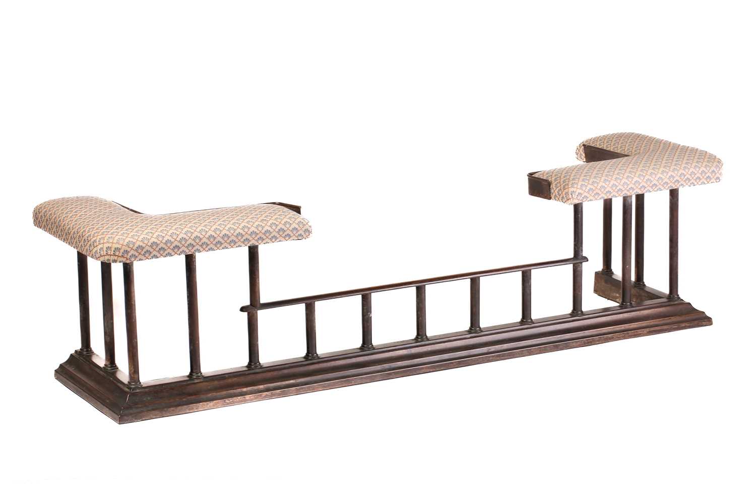 Lot 121 - An Edwardian-style patinated iron club fender...