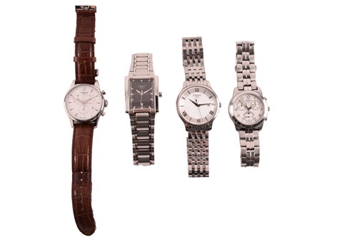 Lot 226 - Four Tissot quartz gentleman watches, the...