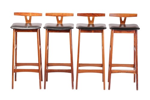Lot 194 - A set of four late 1960s rosewood bar stools,...