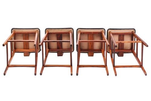 Lot 194 - A set of four late 1960s rosewood bar stools,...