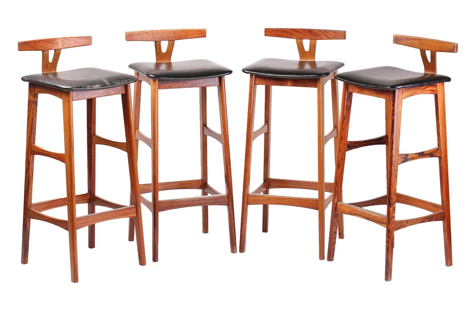 Lot 194 - A set of four late 1960s rosewood bar stools,...