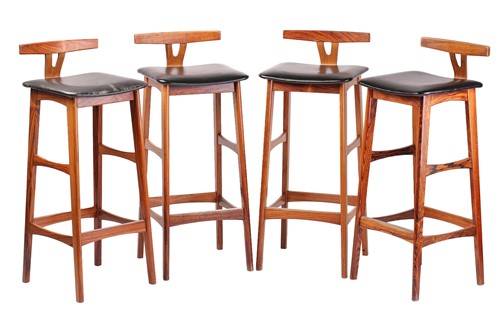 Lot 194 - A set of four late 1960s rosewood bar stools,...