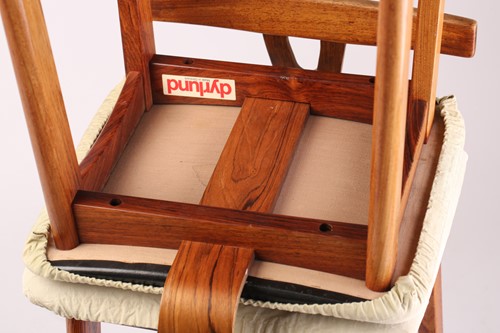 Lot 194 - A set of four late 1960s rosewood bar stools,...