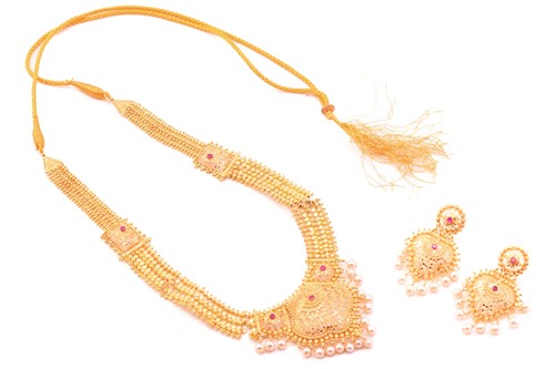 Lot 2 - A yellow metal, ruby and fresh water pearl...