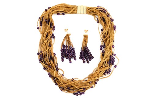 Lot 139 - Calgaro - woven mesh and amethyst beaded...