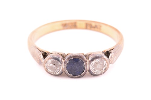 Lot 39 - A three-stone ring with sapphire and diamonds,...
