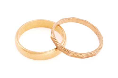 Lot 21 - A 22ct gold wedding band and a 9ct gold ring;...