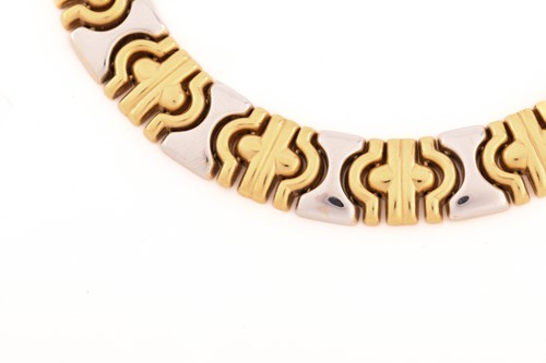 Lot 100 - An 18ct bi-coloured gold necklace in the style...
