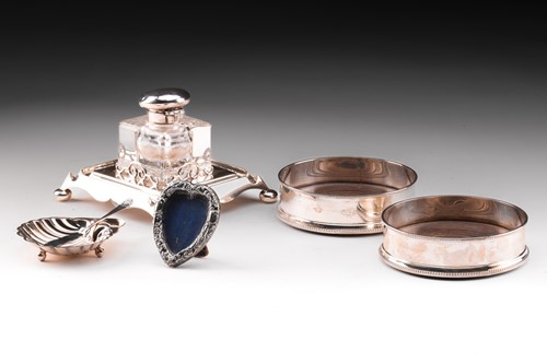 Lot 309 - A pair of modern silver bottle coasters with...