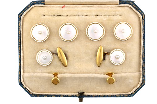 Lot 11 - A mother of pearl and pearl dress set in 18ct...