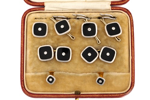 Lot 141 - A black onyx and diamond dress set, of a...