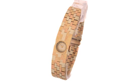 Lot 209 - A 9ct gold Beuche Girod ladies wristwatch, the...