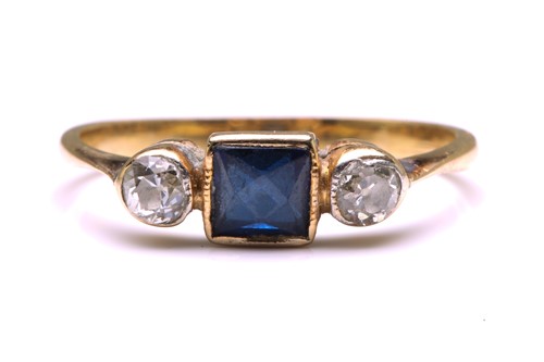 Lot 98 - A sapphire and diamond ring, featuring a...