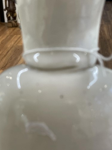 Lot 134 - A Chinese Dehua blanc de chine figure of...