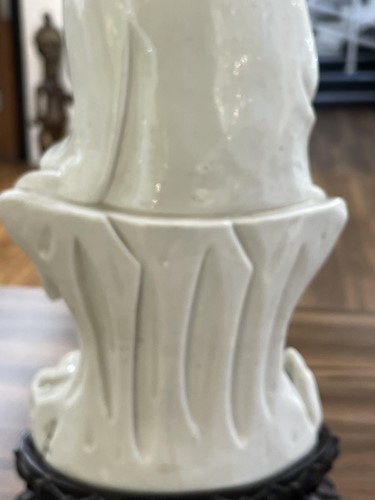 Lot 134 - A Chinese Dehua blanc de chine figure of...