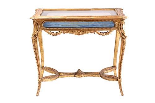 Lot 243 - A Louis XV style carved wood and gilt gesso...