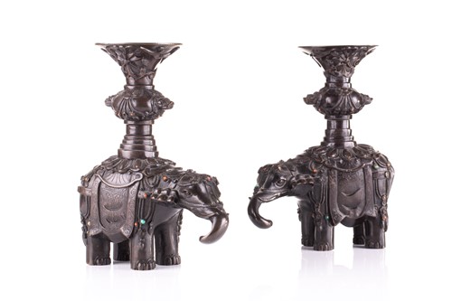 Lot 181 - A pair of Chinese bronze caparisoned elephants,...